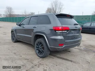 2018 Jeep Grand Cherokee Laredo E with VIN 1C4RJFAG4JC464783, listed as a IAAI auction lot 41664453 with 106,466 mi miles. Bid and sale history available at carsss.com. Image 3.