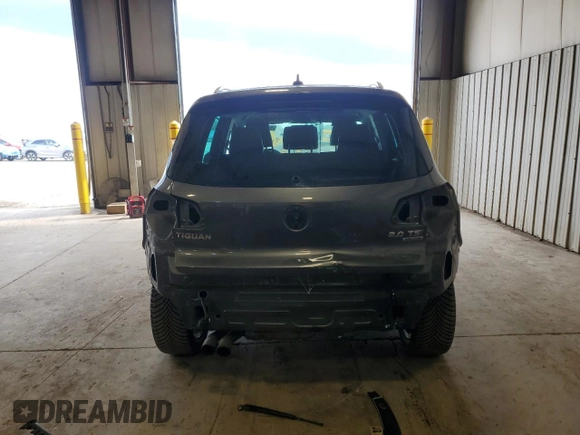 2015 Volkswagen Tiguan SE z VIN WVGBV7AX0FW588451, wystawiony jako Copart lot #51005345 z przebiegiem 104 553 mil mil oraz Szkoda całkowita • Salvage title. Historia ofert i sprzedaży dostępna na DreamBid. Obrazek 6.
