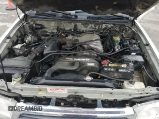 2000 Toyota 4Runner SR5 z VIN JT3GN86R6Y0145225, wystawiony jako Copart lot #58648785 z przebiegiem 162 374 mil mil oraz Czysty tytuł • Clean title. Historia ofert i sprzedaży dostępna na DreamBid. Obrazek 12.