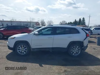 2015 Jeep Cherokee Limited with VIN 1C4PJMDS7FW522581, listed as a IAAI auction lot 41870516 with 143,904 mi miles and . Bid and sale history available at DreamBid. Image 14.