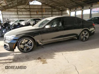 2018 BMW 7 Series M760i xDrive with VIN WBA7H6C57JG614681, listed as a Copart auction lot 46697275 with 45,449 mi miles and Salvage title. Bid and sale history available at DreamBid. Image 1.