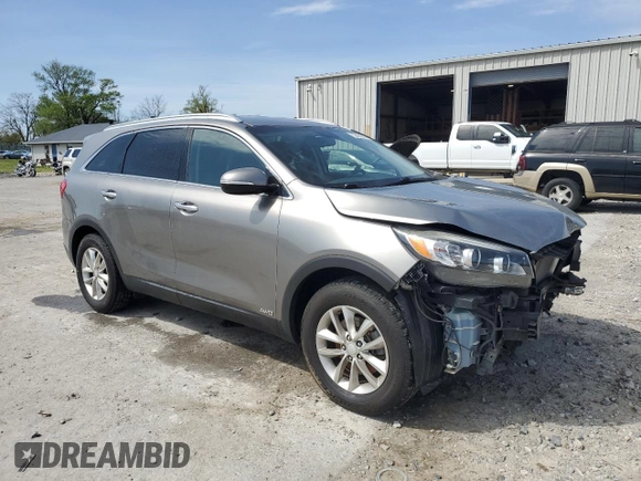 2016 Kia Sorento LX with VIN 5XYPGDA3XGG067929, listed as a Copart auction lot 52092845 with 121,681 mi miles and Salvage Title. Bid and sale history available at DreamBid. Image 4.