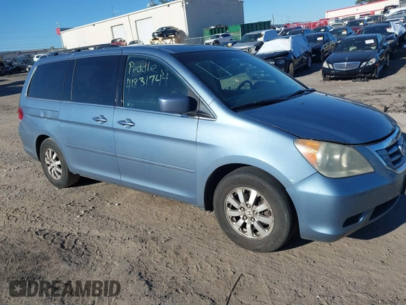 2010 Honda Odyssey EX-L with VIN 5FNRL3H77AB096732, listed as a IAAI auction lot 41831744 with 22,523 mi miles and . Bid and sale history available at DreamBid. Image 1.