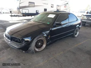 1996 BMW 3-Series 318TI with VIN WBACG8324TAU38424, listed as a IAAI auction lot 41529537 with 160,199 mi miles. Bid and sale history available at carsss.com. Image 17.