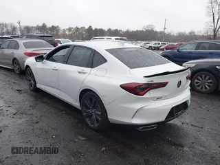 2023 Acura TLX w/A-Spec Package z VIN 19UUB6F52PA002372, wystawiony jako IAAI lot #41968231 z przebiegiem 15 110 mil mil oraz . Historia ofert i sprzedaży dostępna na DreamBid. Obrazek 3.