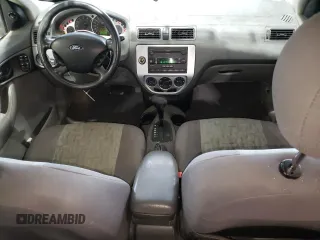 2005 Ford Focus SE with VIN 1FAHP36N65W187161, listed as a Copart auction lot 52024045 with 261,194 mi miles and Salvage Title. Bid and sale history available at carsss.com. Image 8.