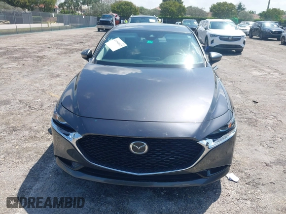 2023 Mazda 3 S Preferred with VIN 3MZBPACM8PM361196, listed as a IAAI auction lot 41940018 with 49,759 mi miles and . Bid and sale history available at DreamBid. Image 13.