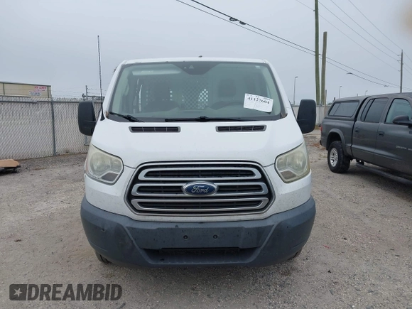 2016 Ford Transit Cargo z VIN 1FTYR1ZM3GKB36643, wystawiony jako IAAI lot #41127604 z przebiegiem 182 845 mil mil oraz . Historia ofert i sprzedaży dostępna na DreamBid. Obrazek 12.