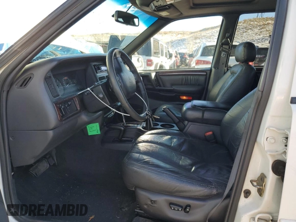 1998 Jeep Grand Cherokee Limited with VIN 1J4GZ88Z9WC180182, listed as a Copart auction lot 88602465 with 266,008 mi miles and Clean Title. Bid and sale history available at carsss.com. Image 7.