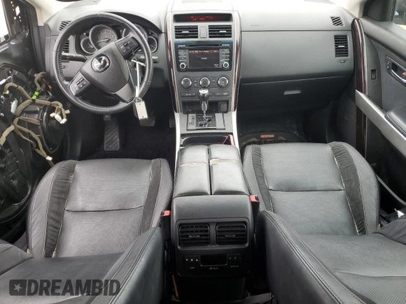 2014 Mazda CX-9 Grand Touring with VIN JM3TB2DA8E0440925, listed as a Copart auction lot 61002275 with 180,373 mi miles and Salvage title. Bid and sale history available at DreamBid. Image 8.