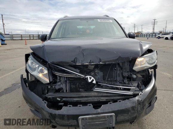 2012 Volkswagen Tiguan SE with VIN WVGAV7AX2CW535869, listed as a Copart auction lot 50589445 with 114,978 mi miles and Salvage Title. Bid and sale history available at DreamBid. Image 5.