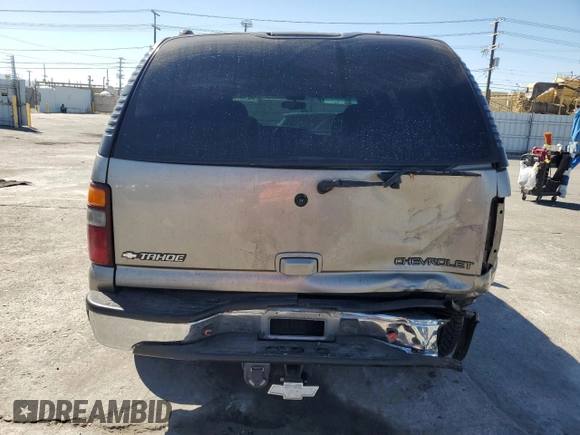 2002 Chevrolet Tahoe LS с VIN 1GNEC13T62R243097, выставлен на аукционе Copart как лот 64210815 с пробегом 254 318 миль миль и Списание • Salvage title. История ставок и продаж доступна на DreamBid. Изображение 6.