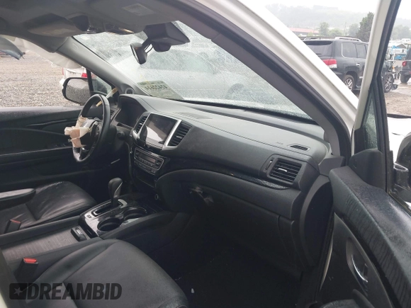2018 Honda Ridgeline RTL-E with VIN 5FPYK3F77JB017293, listed as a IAAI auction lot 42422614 with 87,700 mi miles and . Bid and sale history available at DreamBid. Image 5.