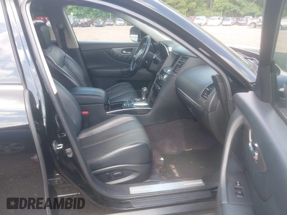2016 Infiniti QX70 with VIN JN8CS1MU7GM670985, listed as a IAAI auction lot 42290094 with 154,588 mi miles and . Bid and sale history available at DreamBid. Image 5.
