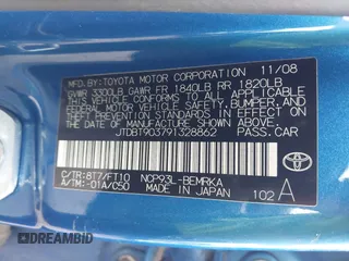 2009 Toyota Yaris z VIN JTDBT903791328862, wystawiony jako IAAI lot #42327669 z przebiegiem 160 747 mil mil oraz . Historia ofert i sprzedaży dostępna na DreamBid. Obrazek 9.