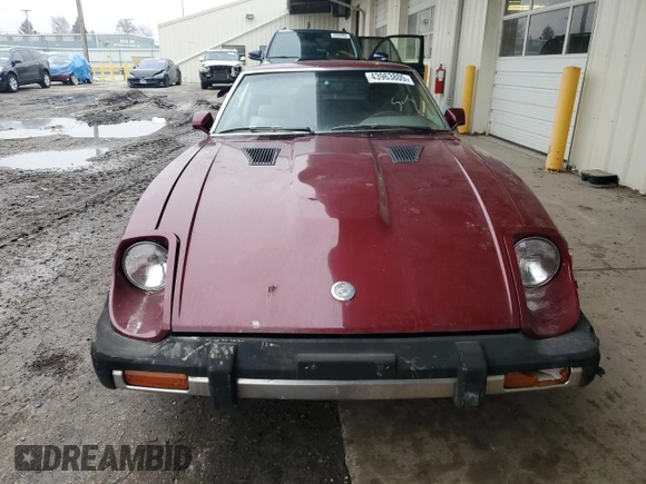 1981 Datsun 280ZX 2+2 z VIN JN1HZ06S3BX408927, wystawiony jako Copart lot #43963805 z przebiegiem 169 783 mil mil oraz Tytuł czysty. Historia ofert i sprzedaży dostępna na DreamBid. Obrazek 5.