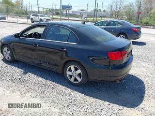 2014 Volkswagen Jetta TDI w/Premium/Nav с VIN 3VWLL7AJXEM435467, выставлен на аукционе IAAI как лот 42056011 с пробегом 167 534 миль миль и . История ставок и продаж доступна на DreamBid. Изображение 3.