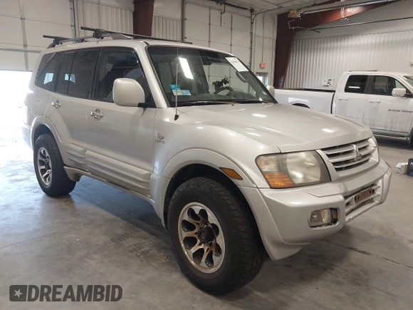 2002 Mitsubishi Montero Limited z VIN JA4MW51RX2J048087, wystawiony jako IAAI lot #42096678 z przebiegiem 218 795 mil mil oraz . Historia ofert i sprzedaży dostępna na DreamBid. Obrazek 1.