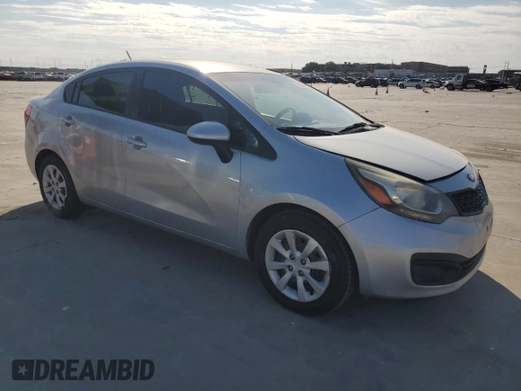 2015 Kia Rio LX with VIN KNADM4A33F6454705, listed as a Copart auction lot 76955904 with 157,078 mi miles and Salvage Title. Bid and sale history available at carsss.com. Image 4.