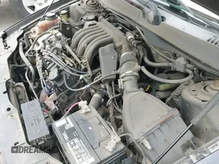 2001 Ford Taurus SE z VIN 1FAFP53U91G207681, wystawiony jako IAAI lot #43428242 z przebiegiem 206 814 mil mil oraz . Historia ofert i sprzedaży dostępna na DreamBid. Obrazek 16.