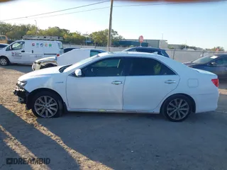2014 Toyota Camry Hybrid LE with VIN 4T1BD1FK7EU114178, listed as a IAAI auction lot 41833139 with 175,117 mi miles. Bid and sale history available at carsss.com. Image 14.