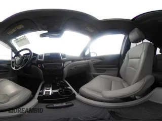 2017 Honda Pilot Touring with VIN 5FNYF6H90HB052474, listed as a IAAI auction lot 42291464 with 103,288 mi miles and . Bid and sale history available at DreamBid. Image 18.
