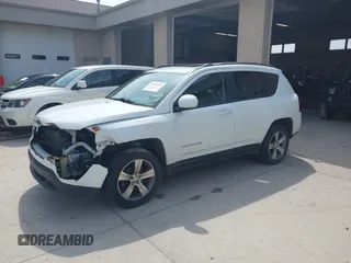 2017 Jeep Compass High Altitude with VIN 1C4NJCEB1HD212246, listed as a IAAI auction lot 42095253 with 123,834 mi miles. Bid and sale history available at carsss.com. Image 2.