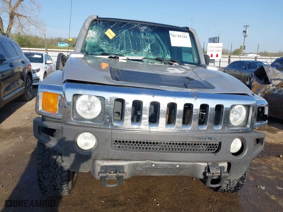 2006 Hummer H3 with VIN 5GTDN136868194546, listed as a IAAI auction lot 41981341 with 128,686 mi miles. Bid and sale history available at carsss.com. Image 12.