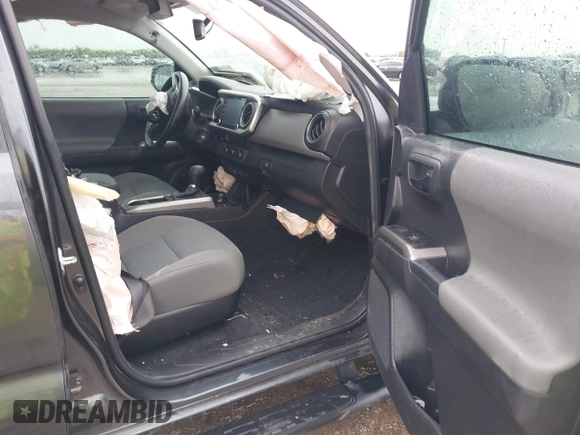 2022 Toyota Tacoma SR5 with VIN 3TMAZ5CN9NM195132, listed as a IAAI auction lot 42383482 with 51,011 mi miles and . Bid and sale history available at DreamBid. Image 5.