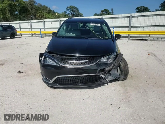 2017 Chrysler Pacifica Touring L with VIN 2C4RC1BG7HR551641, listed as a Copart auction lot 51810185 with 66,860 mi miles and Salvage Title. Bid and sale history available at DreamBid. Image 12.