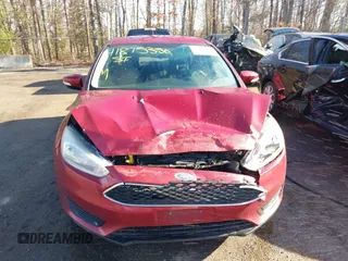 2017 Ford Focus SE z VIN 1FADP3F29HL256838, wystawiony jako IAAI lot #41875356 z przebiegiem 178 673 mil mil oraz . Historia ofert i sprzedaży dostępna na DreamBid. Obrazek 12.