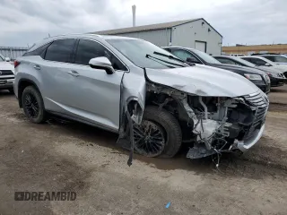 2016 Lexus RX 350 with VIN 2T2BZMCA4GC042001, listed as a Copart auction lot 52224275 with 235,659 mi miles and Salvage title. Bid and sale history available at DreamBid. Image 4.