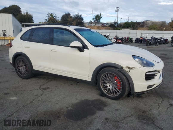 2012 Porsche Cayenne Turbo with VIN WP1AC2A23CLA81911, listed as a Copart auction lot 78679924 with 197,166 mi miles and Salvage title. Bid and sale history available at DreamBid. Image 4.