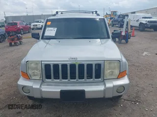 2010 Jeep Commander Sport with VIN 1J4RH4GKXAC157379, listed as a IAAI auction lot 42130174 with 193,337 mi miles and . Bid and sale history available at DreamBid. Image 12.