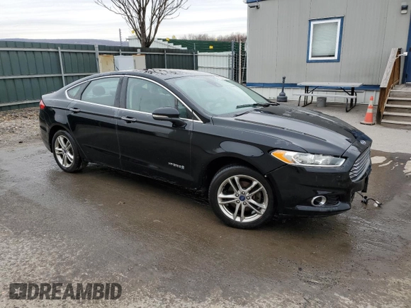 2016 Ford Fusion Titanium Hybrid with VIN 3FA6P0RU6GR324405, listed as a Copart auction lot 51382585 with 0 mi miles and Salvage Title. Bid and sale history available at carsss.com. Image 4.