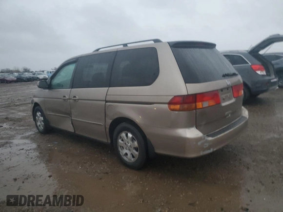 2003 Honda Odyssey EX-L with VIN 5FNRL189X3B074426, listed as a Copart auction lot 84422814 with 148,602 mi miles and Salvage Title. Bid and sale history available at DreamBid. Image 2.