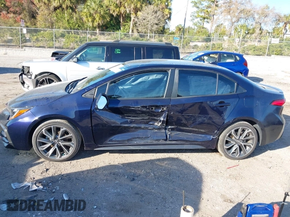 2021 Toyota Corolla SE with VIN 5YFS4MCE3MP063746, listed as a IAAI auction lot 41472956 with 72,199 mi miles. Bid and sale history available at carsss.com. Image 14.