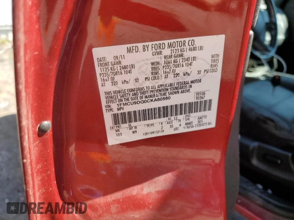 2012 Ford Escape XLT with VIN 1FMCU9DG0CKA80580, listed as a Copart auction lot 87202144 with 173,098 mi miles and Salvage title. Bid and sale history available at DreamBid. Image 13.