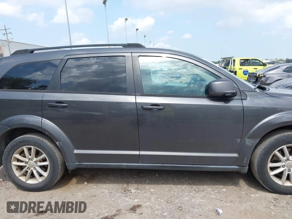 2017 Dodge Journey SXT z VIN 3C4PDCBB9HT507917, wystawiony jako IAAI lot #42322823 z przebiegiem 131 011 mil mil oraz . Historia ofert i sprzedaży dostępna na DreamBid. Obrazek 14.
