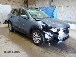 2015 Mazda CX-5 Sport with VIN JM3KE4BY9F0552942, listed as a Copart auction lot 54750245 with 129,700 mi miles and Salvage title. Bid and sale history available at DreamBid. Image 4.
