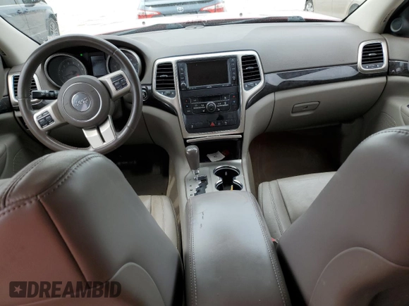 2011 Jeep Grand Cherokee Laredo with VIN 1J4RR4GG7BC701623, listed as a Copart auction lot 50833135 with 268,773 mi miles and Salvage Title. Bid and sale history available at DreamBid. Image 8.