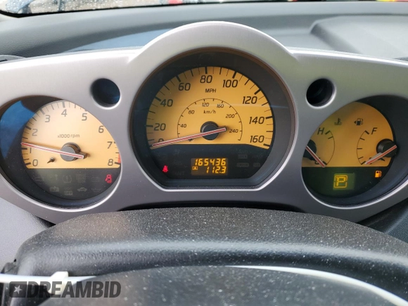 2005 Nissan Murano SL z VIN JN8AZ08T45W318883, wystawiony jako Copart lot #56180225 z przebiegiem 165 436 mil mil oraz Szkoda całkowita • Salvage title. Historia ofert i sprzedaży dostępna na DreamBid. Obrazek 9.