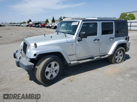 2007 Jeep Wrangler Unlimited Sahara with VIN 1J8GA59137L181360, listed as a Copart auction lot 62311225 with 151,393 mi miles and Salvage title. Bid and sale history available at DreamBid. Image 1.