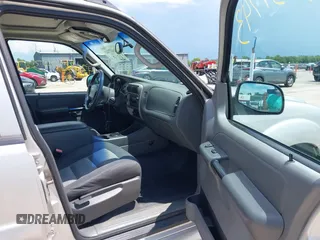 2004 Ford Explorer Sport Trac XLS z VIN 1FMZU77K64UA98358, wystawiony jako IAAI lot #42637743 z przebiegiem 158 359 mil mil oraz . Historia ofert i sprzedaży dostępna na DreamBid. Obrazek 5.