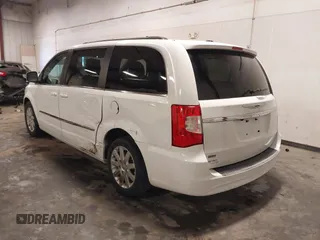 2015 Chrysler Town & Country Touring with VIN 2C4RC1BG9FR626482, listed as a IAAI auction lot 41879865 with 129,694 mi miles and . Bid and sale history available at DreamBid. Image 3.