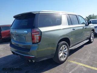 2023 Chevrolet Suburban Premier with VIN 1GNSCFKD4PR378869, listed as a IAAI auction lot 41802386 with 58,569 mi miles. Bid and sale history available at carsss.com. Image 4.