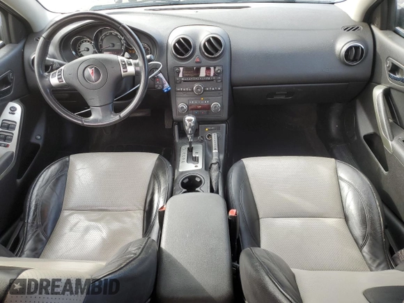 2009 Pontiac G6 with VIN 1G2ZL577094232011, listed as a Copart auction lot 77175054 with 133,353 mi miles and Salvage title. Bid and sale history available at DreamBid. Image 8.