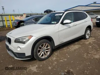 2015 BMW X1 xDrive28i with VIN WBAVL1C58FVY28445, listed as a Copart auction lot 49148015 with 144,319 mi miles and Clean Title. Bid and sale history available at carsss.com. Image 1.