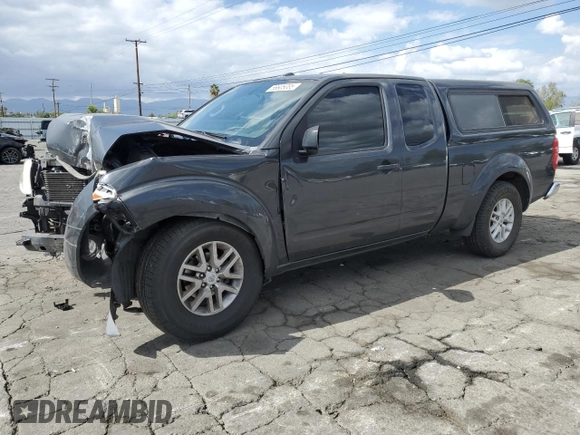 2015 Nissan Frontier SV with VIN 1N6BD0CTXFN708820, listed as a Copart auction lot 56605085 with 119,299 mi miles and Salvage title. Bid and sale history available at DreamBid. Image 1.