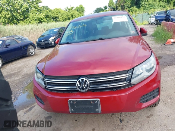 2012 Volkswagen Tiguan SE with VIN WVGAV7AX6CW090956, listed as a IAAI auction lot 42716526 with 227,665 mi miles and . Bid and sale history available at DreamBid. Image 6.